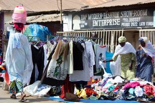 Africa's secondhand clothing market balances economic promise and pressures