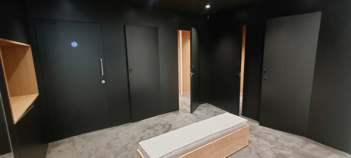 Rear store area with fitting rooms.