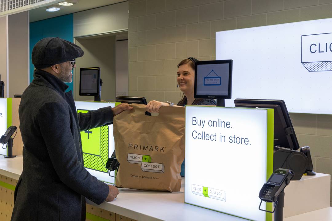 Primark customers collect their order from a dedicated Click + Collect desk