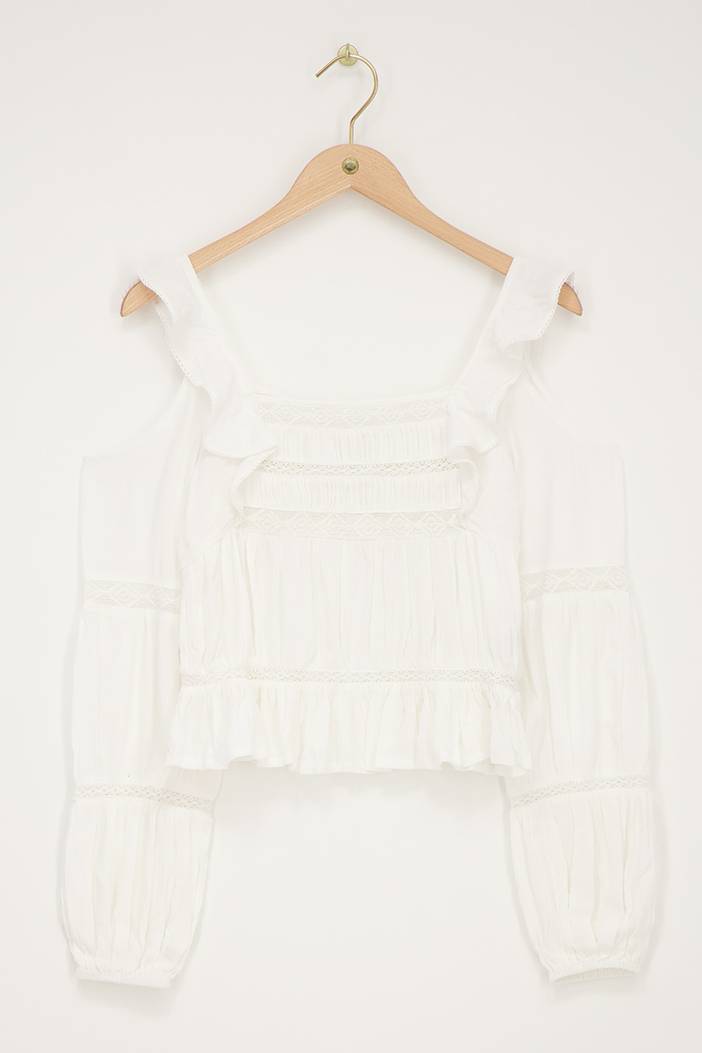 Witte top met lange mouwen met tapes en ruffles | My Jewellery