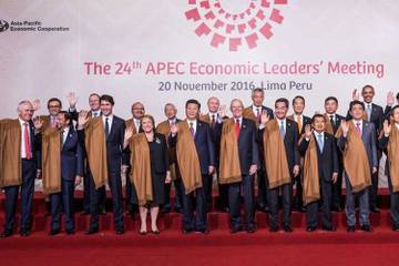 World leaders tone it down in Peru with shawls after baggy ponchos