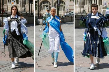 Schueller de Waal cleans the streets during couture week