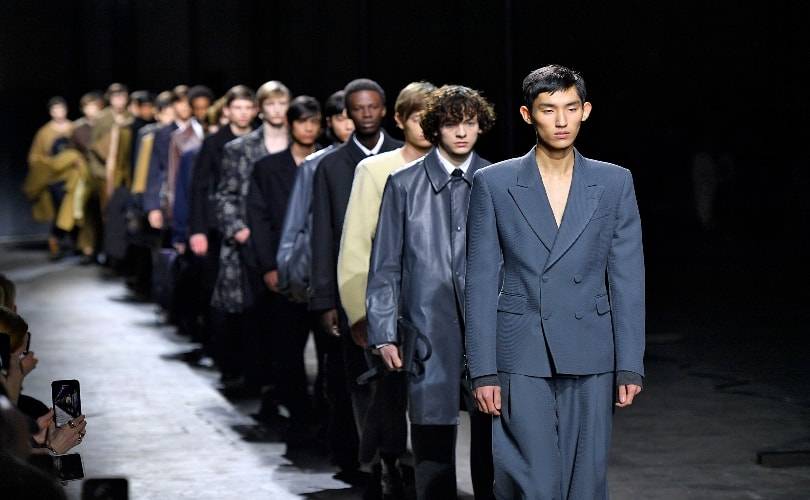 Dowdy no more: Men in suits storm back into style