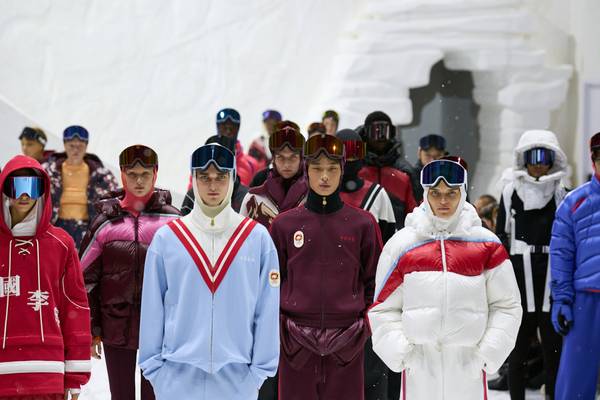 Li-Ning accende il fuoco olimpico a Milano