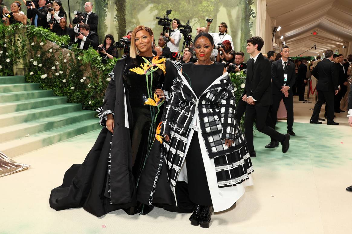 Queen Latifah and Eboni Nichols in Thom Browne.