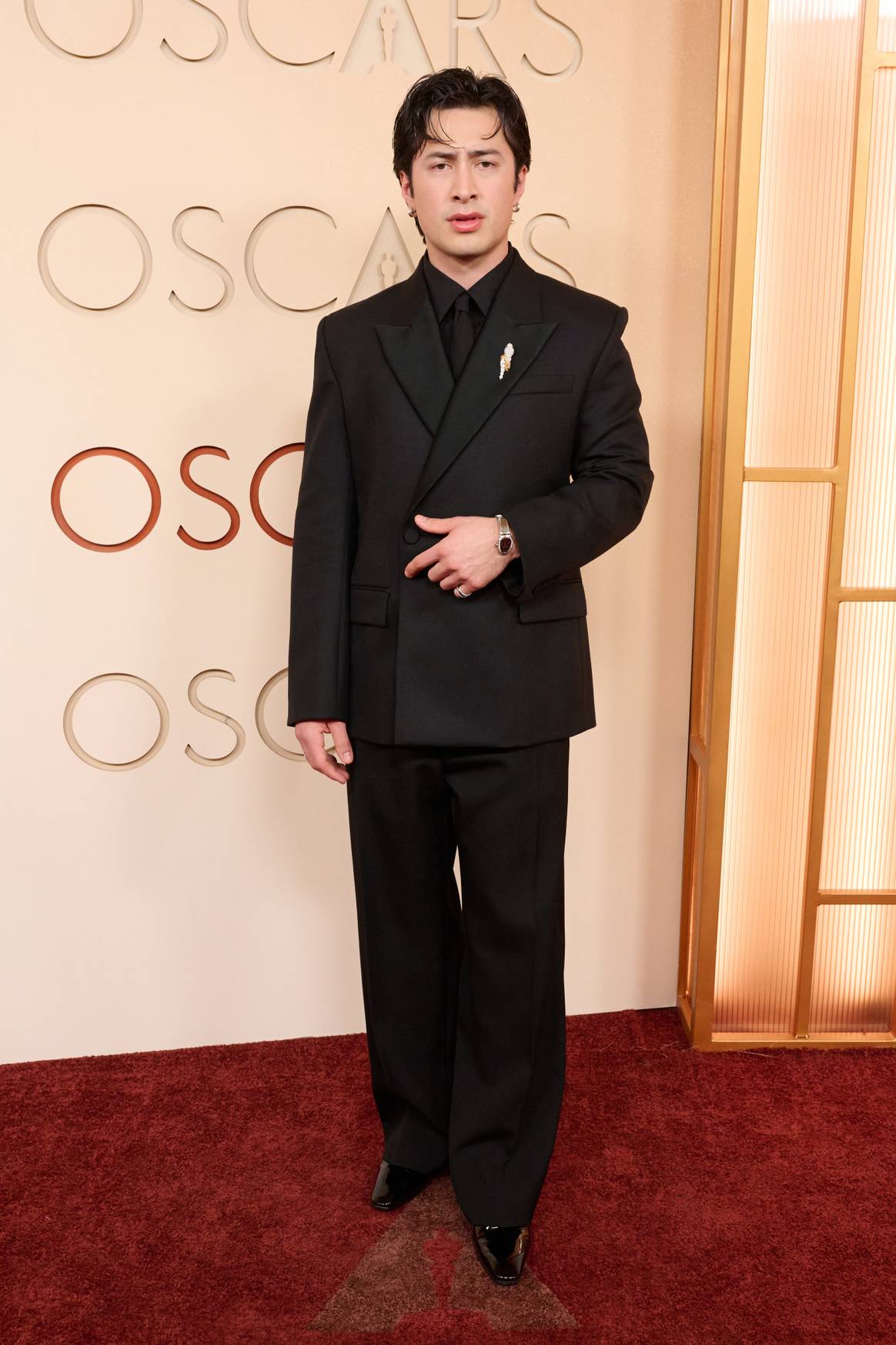 Hudson Williams wears Balenciaga on the red carpet of the 98th Oscars® at the Dolby® Theater.