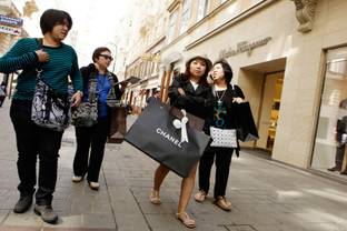 Waarom Chinezen reizen voor luxe kleding en accessoires