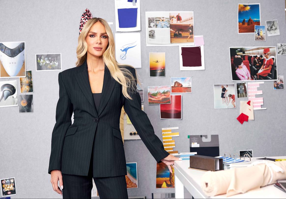 Rebecca Vallance in front of moodboard for Qantas airline uniform redesign