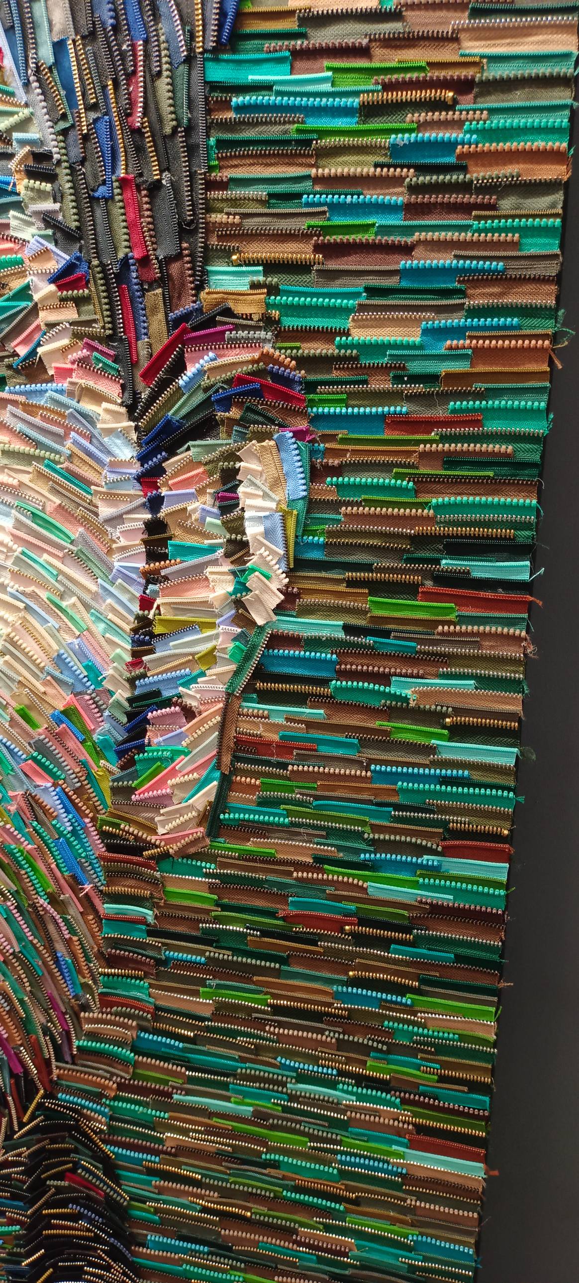 Close-up of Deniz Sağdıç’s portrait made out of zippers. Image: FashionUnited