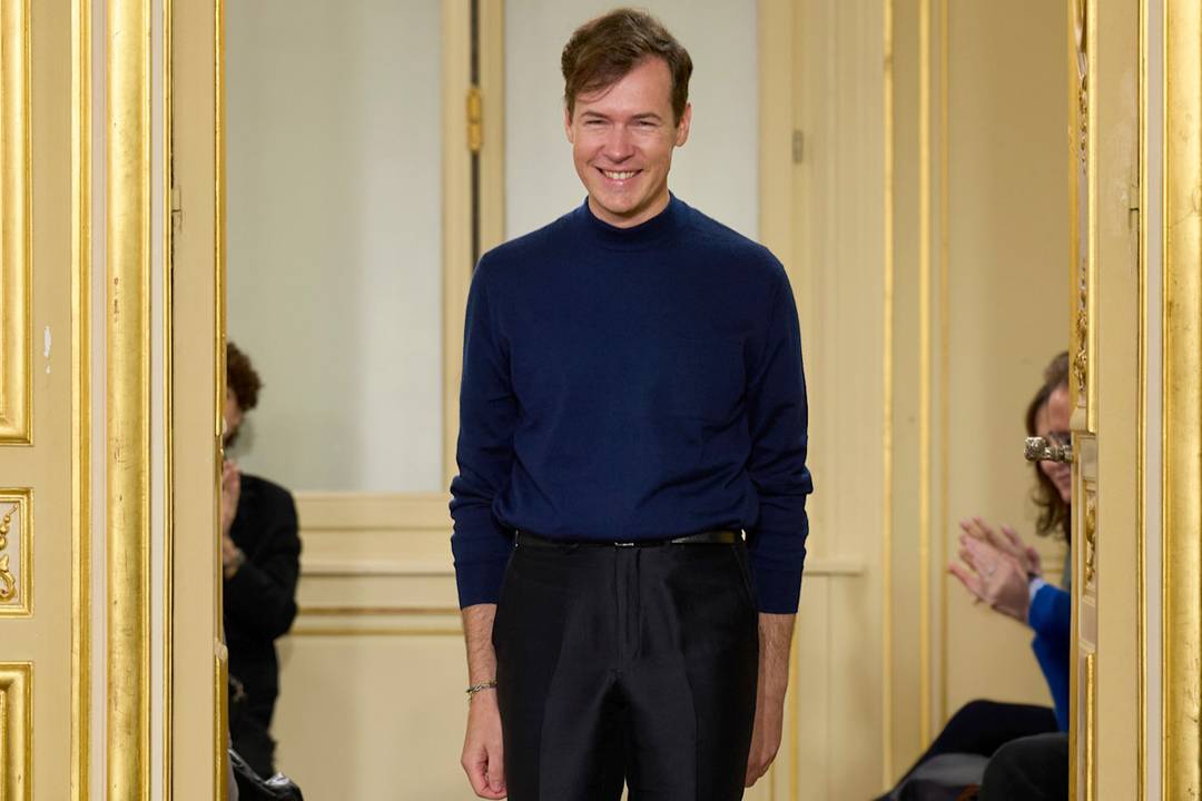 Georg Lux takes a bow at the end of the Leonard SS26 show.