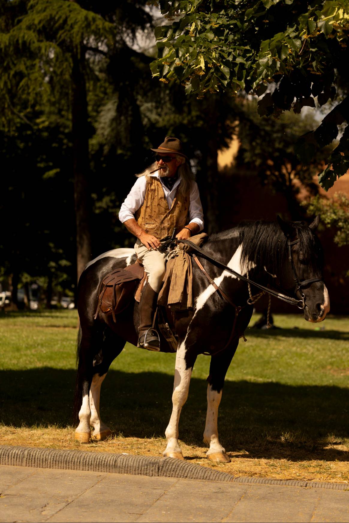 Un cowboy y su caballo en la Pitti Uomo