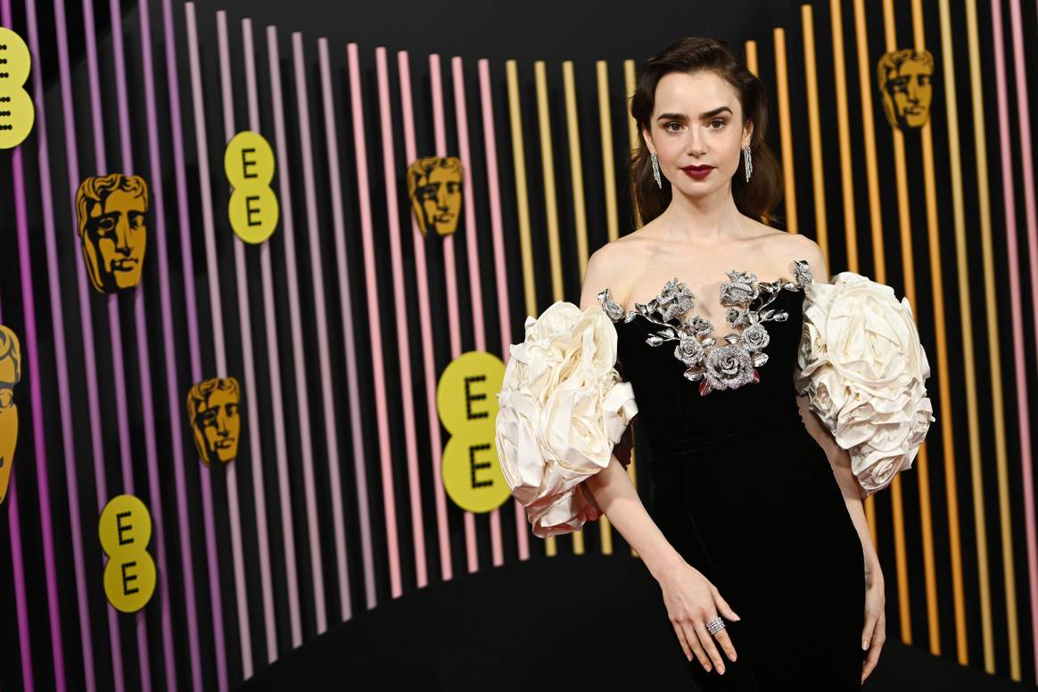 Lily Collins in Tamara Ralph.