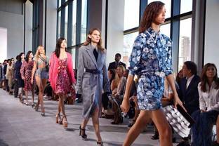 Michael Kors celebrates "powerful romance" at NYFW