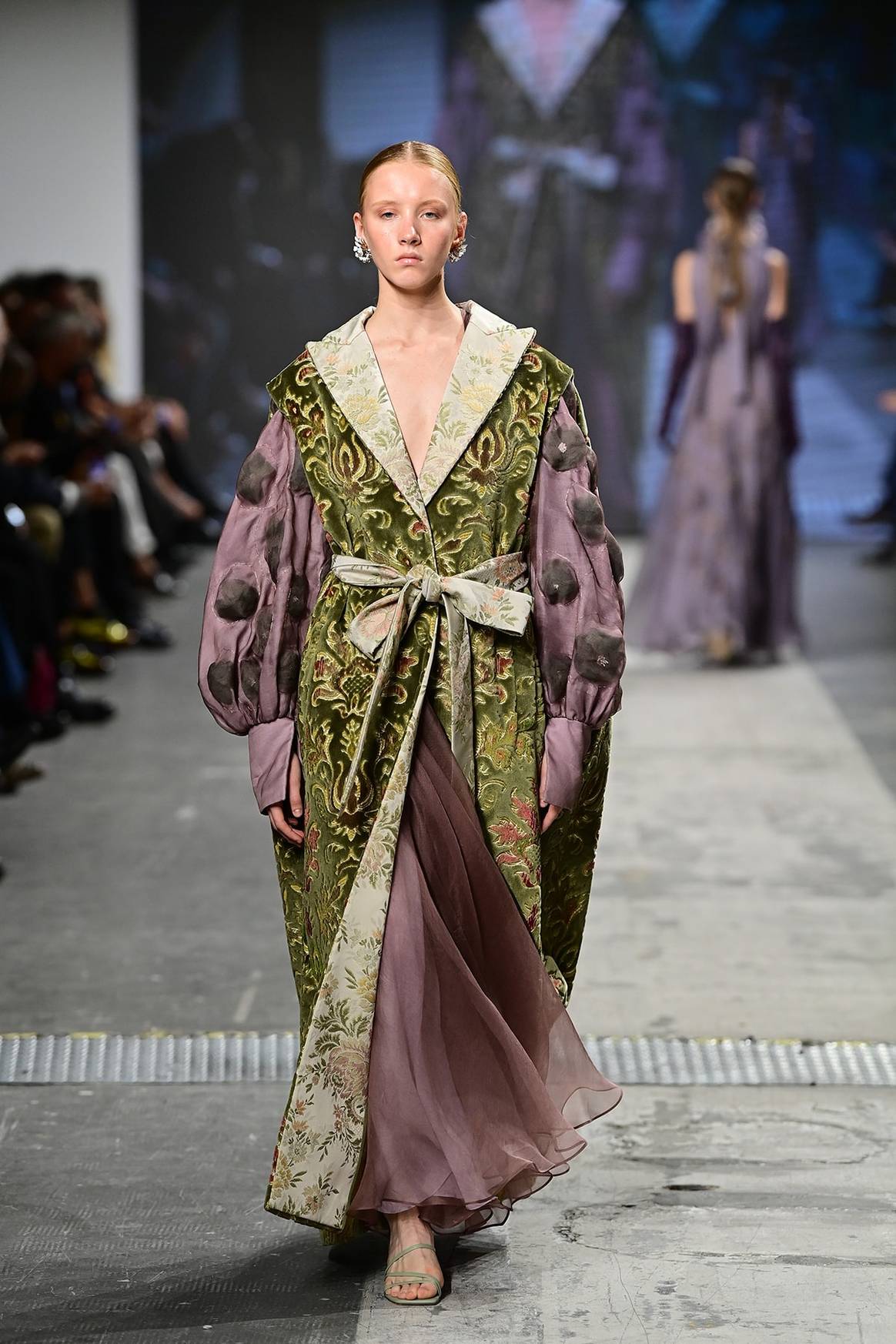 Students of Accademia Costume & Moda show designs during Fashion Graduate Italia