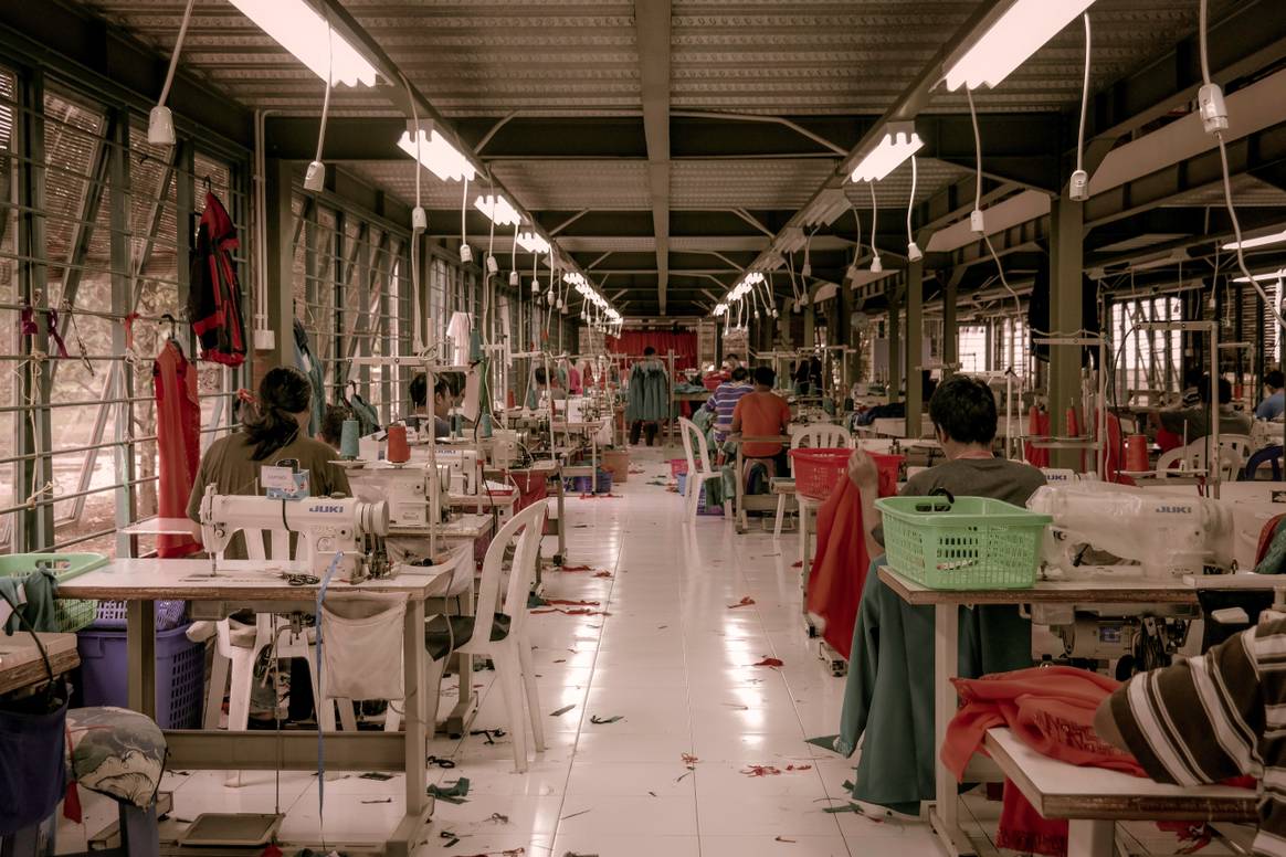 Image: clothing factory, Ciawi, Bogor, West Java, Indonesia, published on October 27, 2020, Unsplash License. Photo by Rio Lecatompessy on Unsplash.