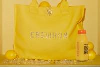 SWAROVSKI celebrates 130 years of joy with signature Erewhon bag and juice