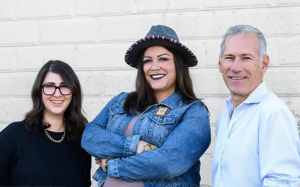 Jori Miller Sherer, Minnetonka President (Left), Adrienne Benjamin, Reconciliation Advisor (Center), David Miller, Minnetonka CEO (Right)