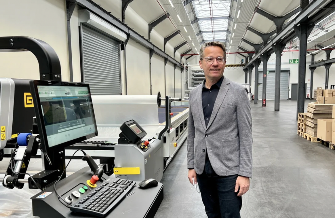 Uwe Gansfort, Managing Director of C&A's flagship denim factory in Mönchengladbach, explaining how the warehouse works.