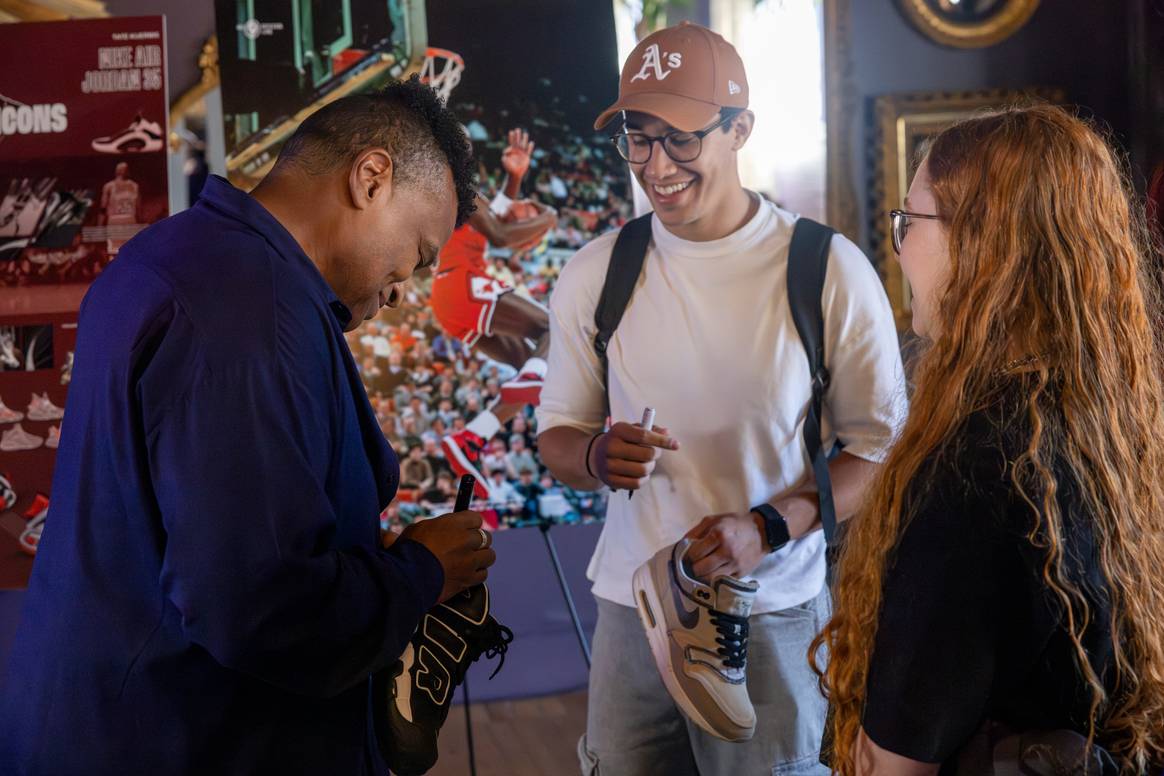 Wilson Smith signing a student's Air Jordans at SCAD Sneaker Culture Week 2025