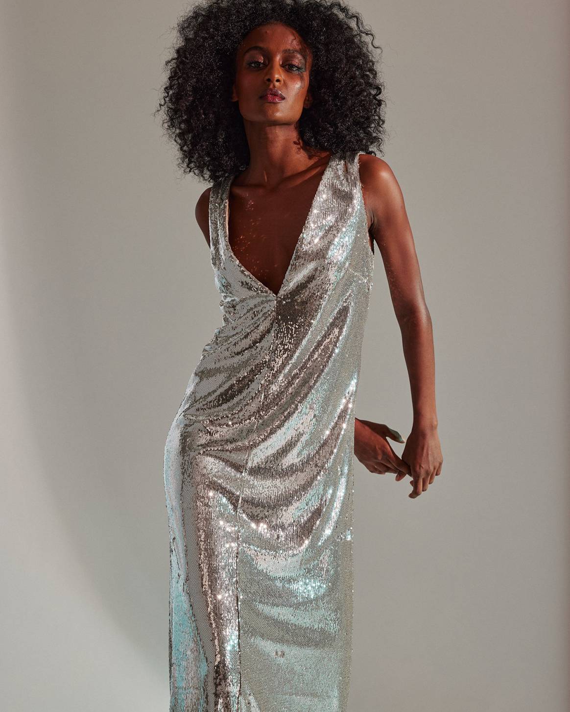 Photo Credits: “Bianca” V-neck sequins gown. Halston x Netflix.