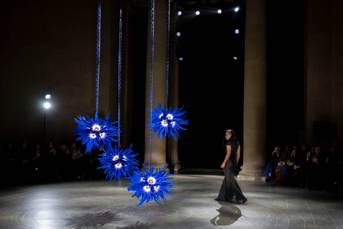 Florence Pugh opening Harris Reed's AW25 show.