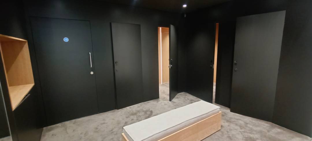Rear store area with fitting rooms.