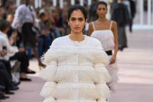    Feathers fly at Chanel's Paris fashion return