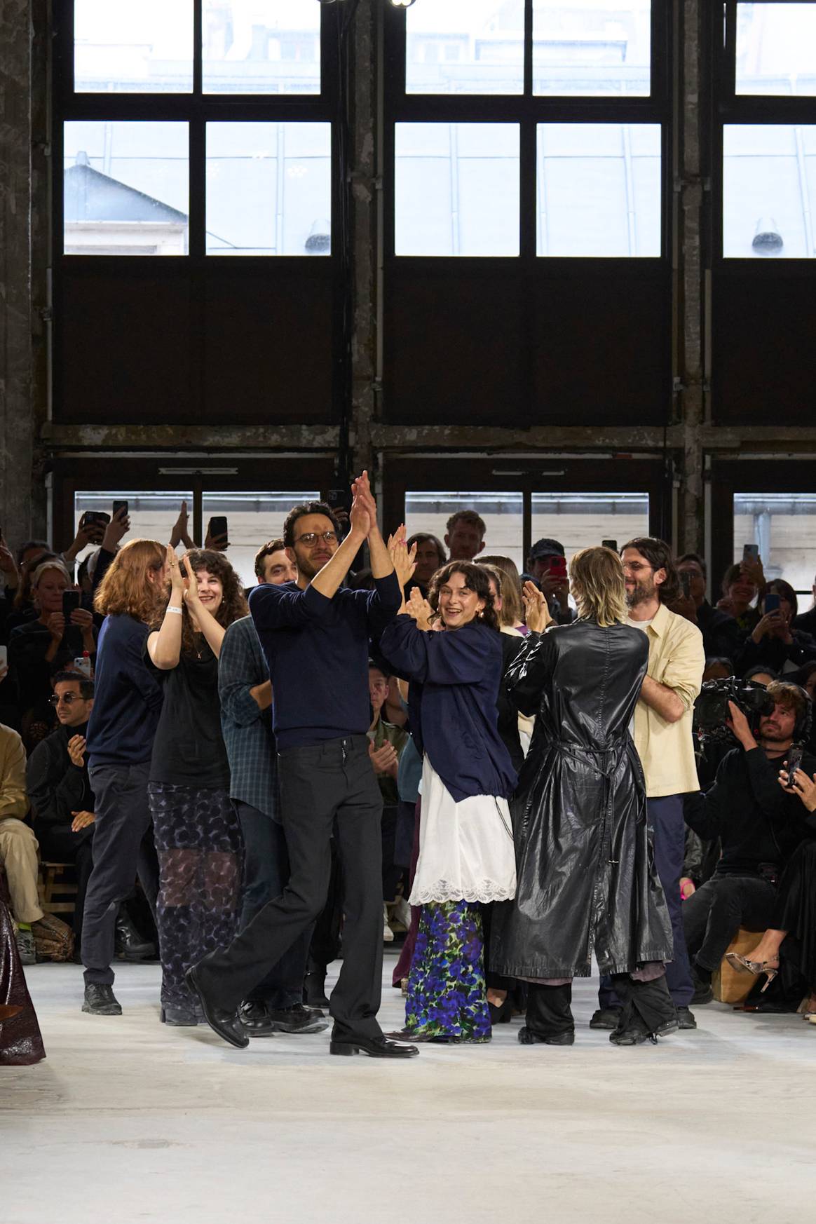 The Dries van Noten studio team takes a bow for the first time.