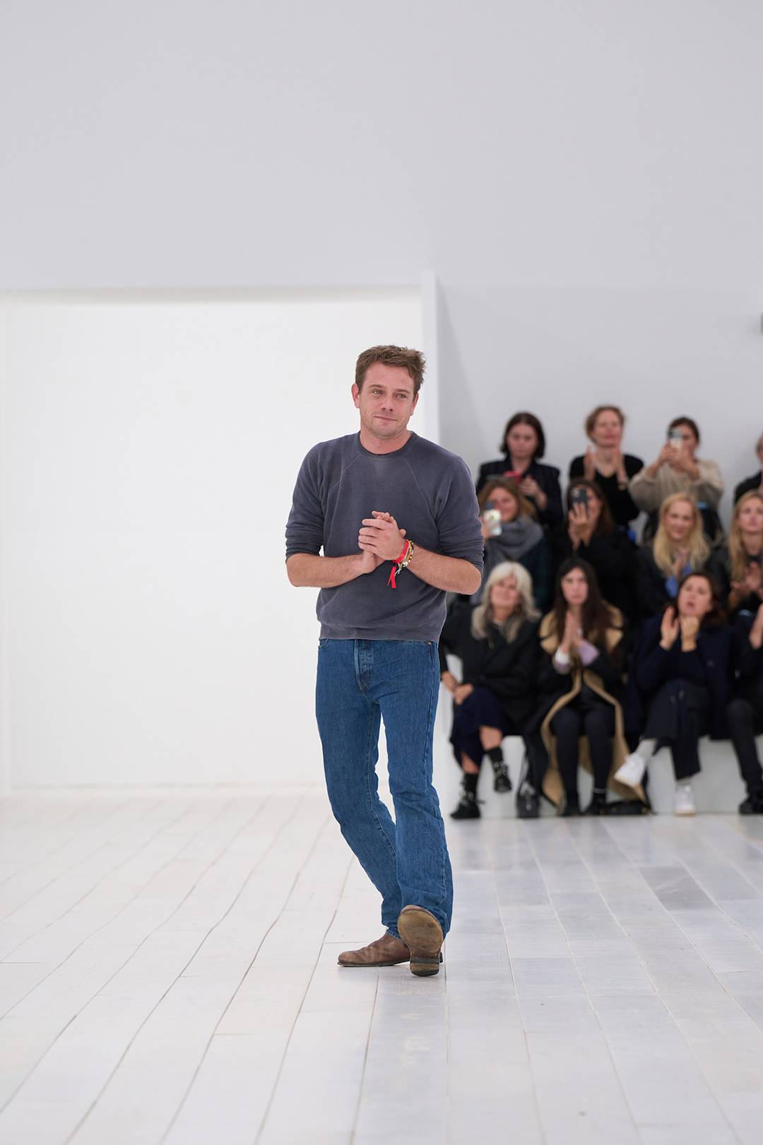 Jonathan Anderson at the close of the Loewe women’s collection presentation for the spring/summer 2025 season.