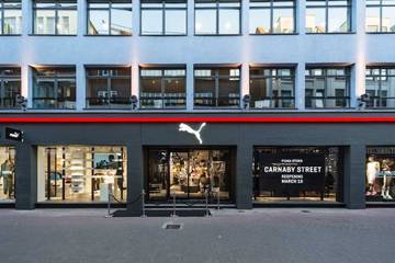 Puma swings to loss as Covid-19 hits sales, scraps full-year outlook