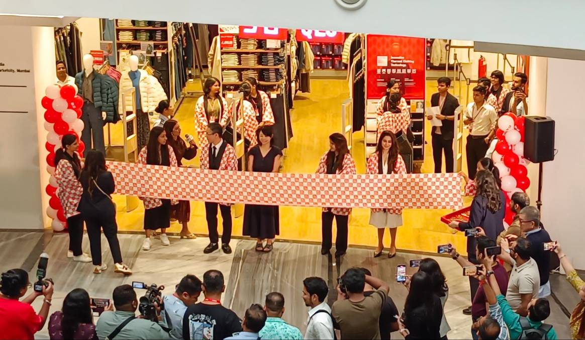 Getting ready to cut the ribbon. Credits: FashionUnited