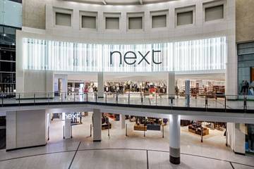 Next ups profit forecast again following sales surge