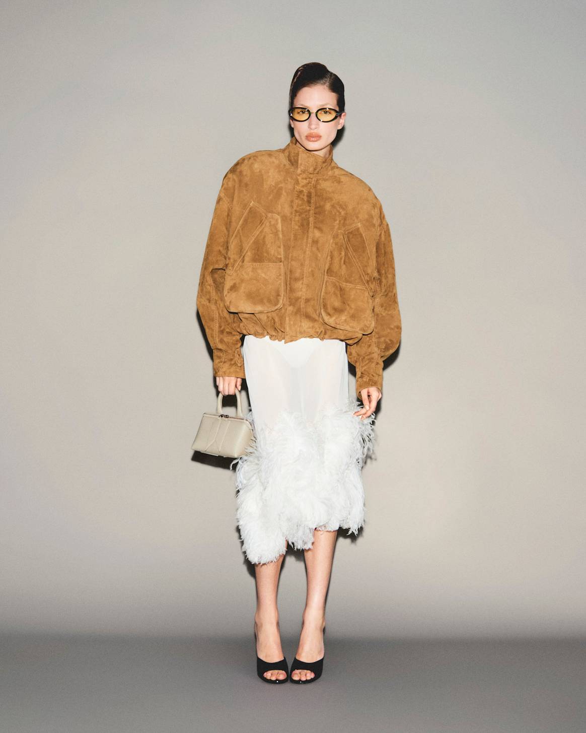 Suede jacket, suede, feather hem, feather skirt at The Attico Off Season 2026, Resort Women