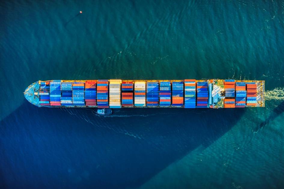 Cargo ships and containers at port illustrating import cargo trends for 2025