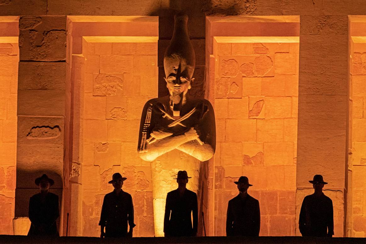 Models present creations by Italy's Stefano Ricci at the temple of Hatshepsut in Luxor, October 9, 2022. Photo by Khaled Desouki / AFP