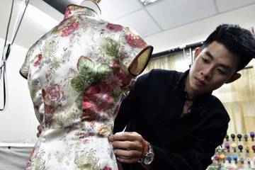 New blood and old masters keep qipao dressmaking alive