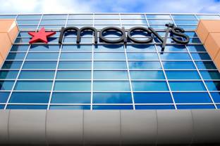 Macy's cuts full year earnings forecast