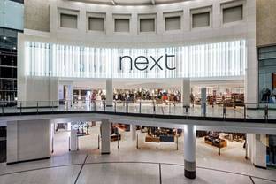 Next ups profit forecast again following sales surge