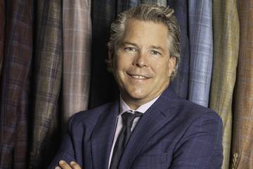 Peerless Clothing announces departure of president John Tighe