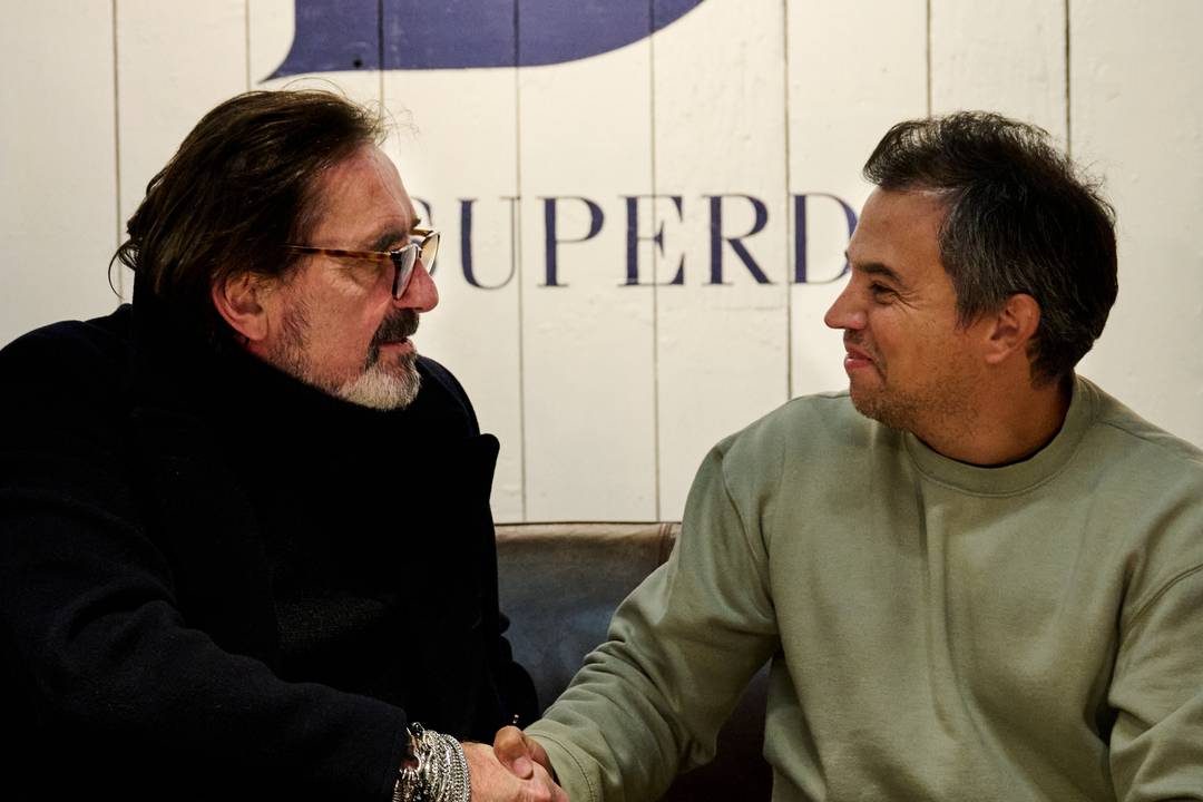 Superdry CEO Julian Dunkerton signing the contract with Tango Fabric