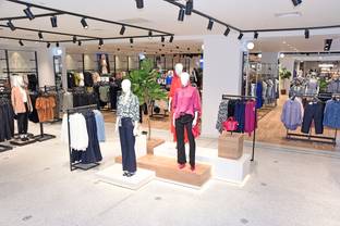 Next cuts guidance as rising inflation dampens consumer demand