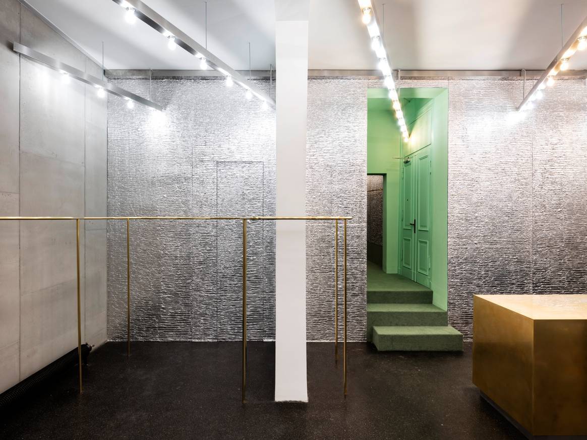 Use of color in shop concepts. This is the Christian Wijnants store in Berlin. The Antwerp-based designer combines silver wallcoverings with greenery. Credit: Christian Wijnants via Turbulence PR