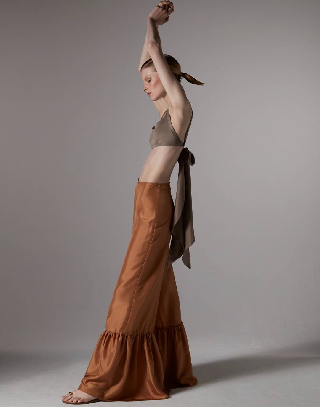 Nightswimming Ruffle Pant in Palo Santo and Sash Crop in Mineral.
