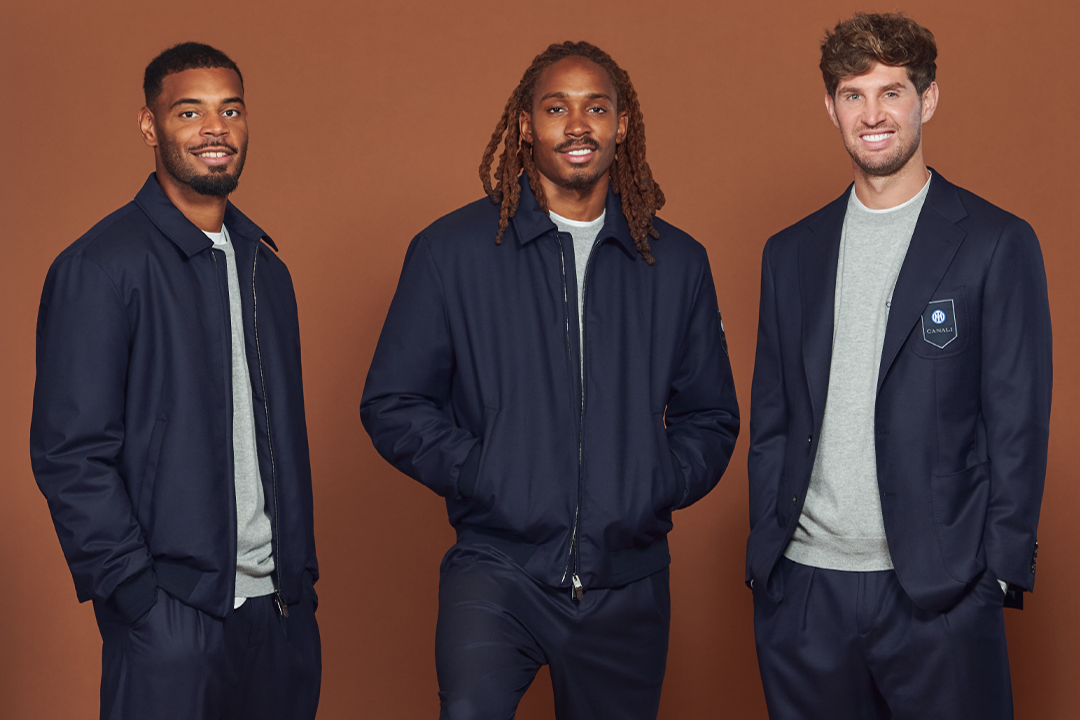 Da sinistra Andy Diouf, Djed Spence, John Stones con la collezione Canali