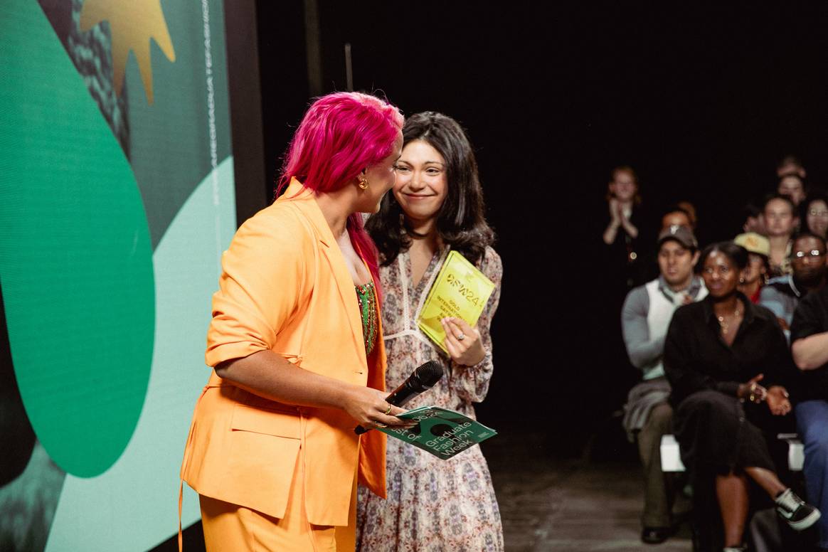 Alice Daggett receiving the Gold Award.