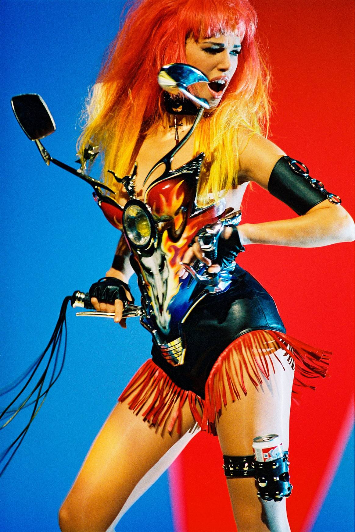 Image: Emma Sjöberg during the shooting of the video for George Michael’s song “Too Funky” — Paris, 1992 Directed by Thierry Mugler Les Cow-boys collection Prêt-à-porter spring/summer 1992 © Patrice Stable