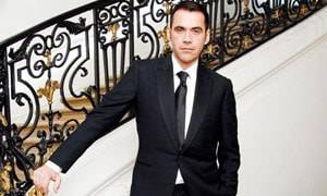 Roland Mouret buys rights to his name