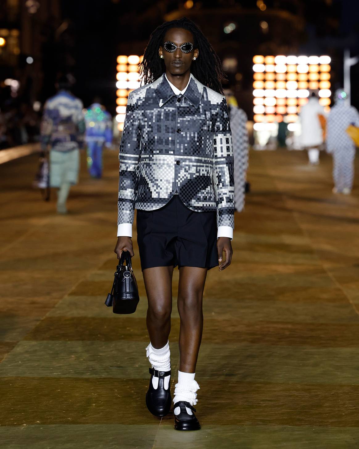 Het debuut van Pharrell Williams voor Louis Vuitton. Beelden via Louis Vuitton