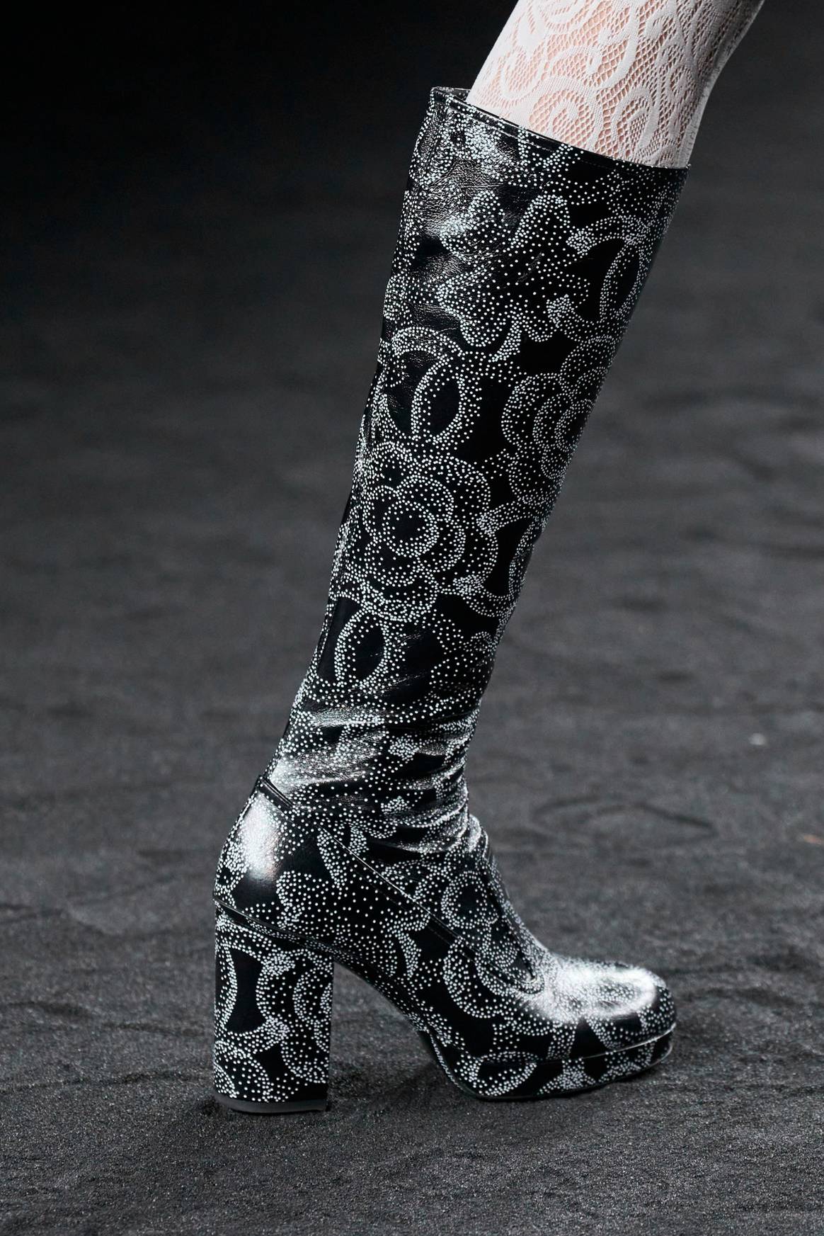 Chanel FW23 knee high boot with camelia logo