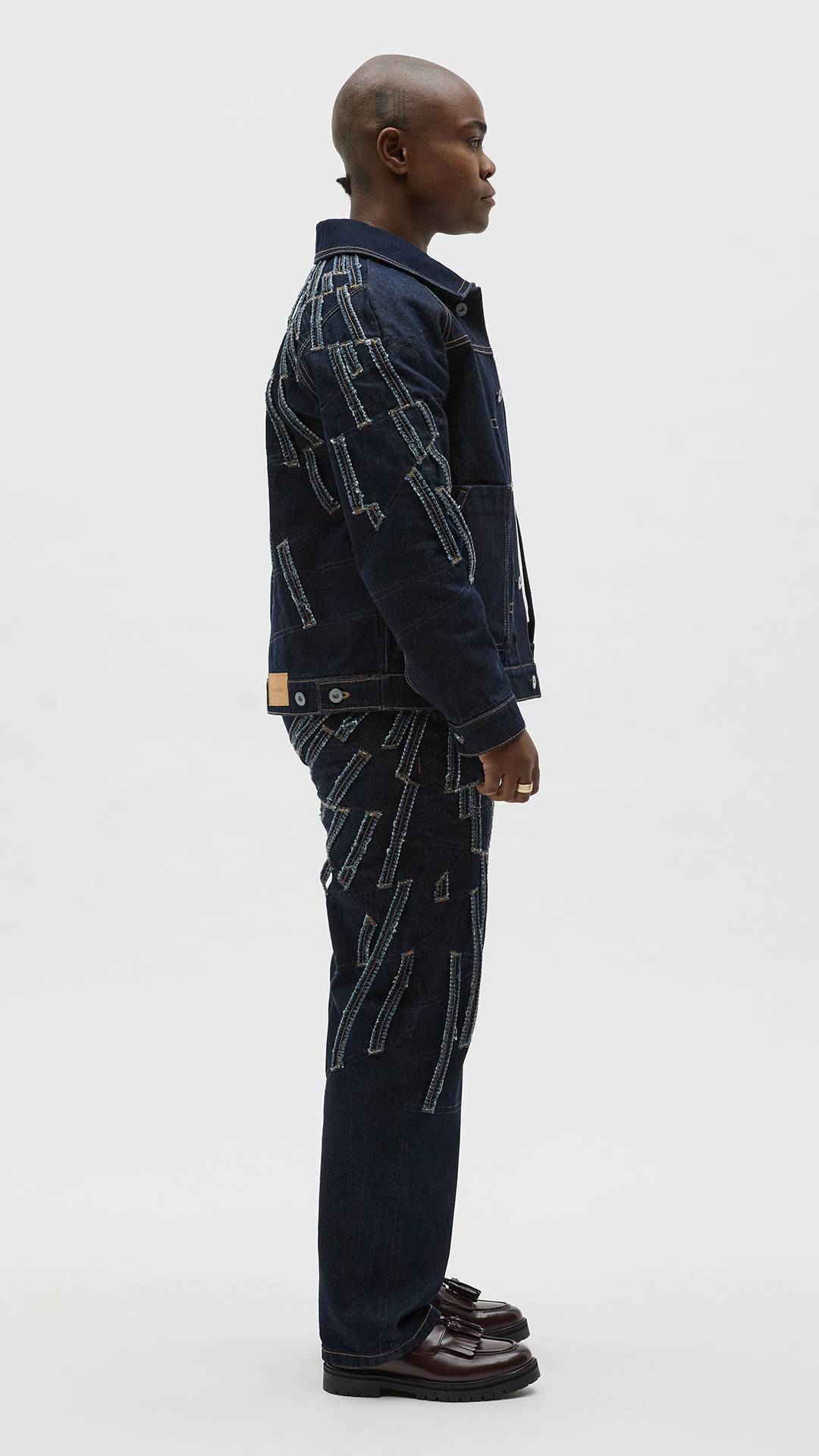 Denim jacket and trousers with a pattern made from leftover fabric by finalist Tobias Beigi.